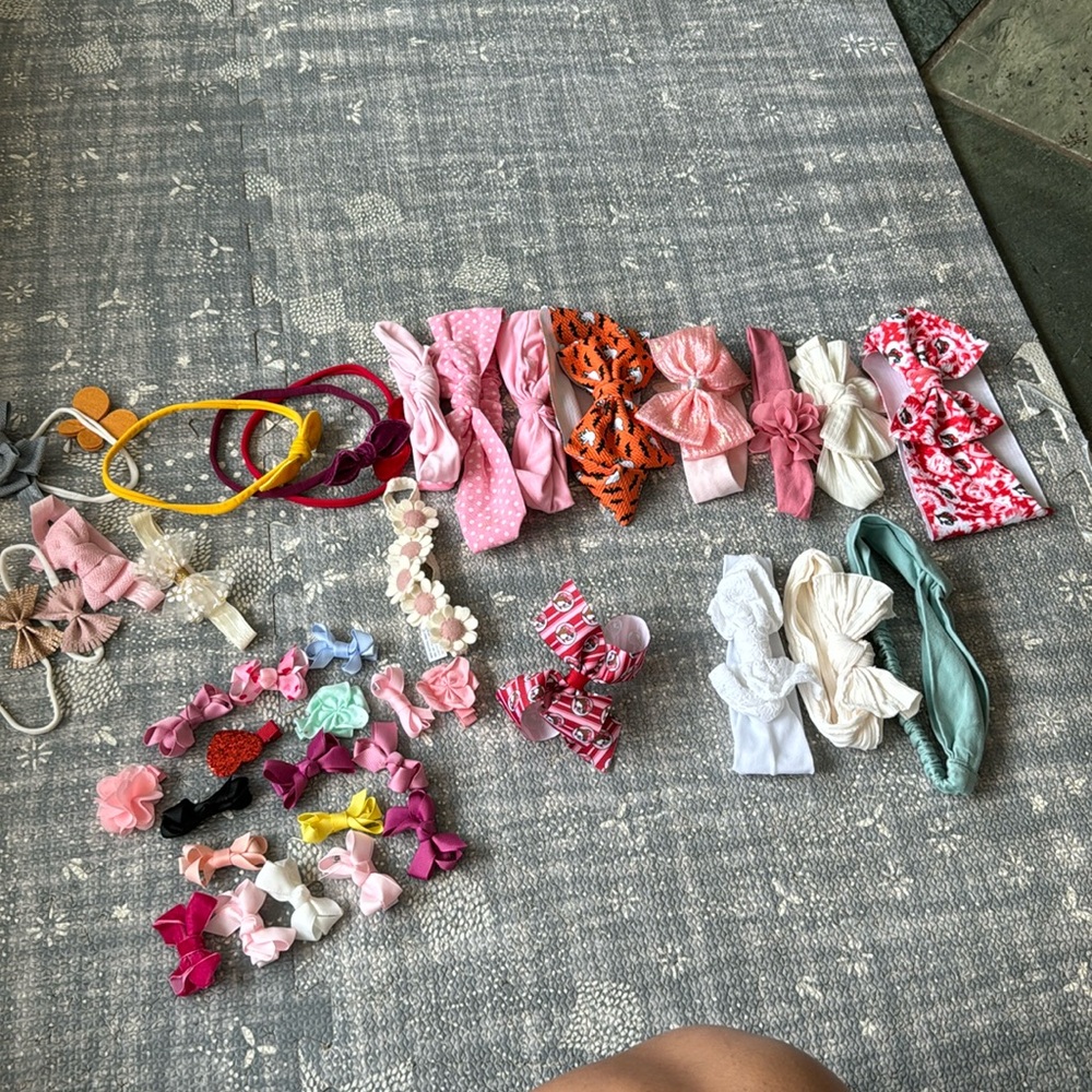 Assortment of baby headbands and clips